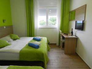 מיטה או מיטות בחדר ב-YourCroatiaHoliday - Villa with 6 rooms