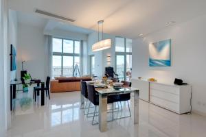 Ein Sitzbereich in der Unterkunft Marvellous Apartment in Tigne Point