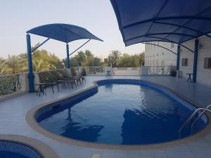 Bazén v ubytování Royal Gardens Hotel nebo v jeho okolí