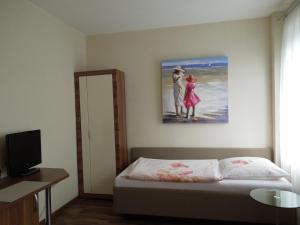 Postel nebo postele na pokoji v ubytování Hotel Gode Wind