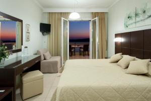 Posteľ alebo postele v izbe v ubytovaní Hotel Anezina