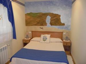 Cama ou camas em um quarto em O Lar de Carmiña