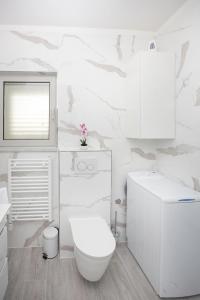 Kúpeľňa v ubytovaní Villa Apartments Art