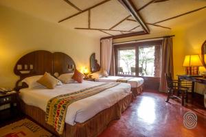 Voodi või voodid majutusasutuse Serengeti Serena Safari Lodge toas