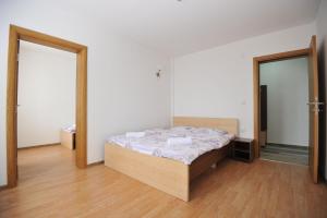 מיטה או מיטות בחדר ב-Dobricin Konak Apartments