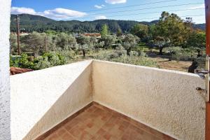 a view from the balcony of a house at Villa Angela in Vourvourou