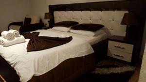Postel nebo postele na pokoji v ubytování Hotel Livia