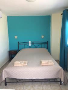Postel nebo postele na pokoji v ubytování Sokaki rooms