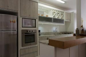 Kuchyň nebo kuchyňský kout v ubytování Apartamento em Gramado - Vista para o Vale
