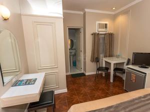 Kuchyň nebo kuchyňský kout v ubytování Urban Travellers Hotel