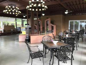 Un restaurant sau alt loc unde se poate mânca la Shell Villa apartel resort