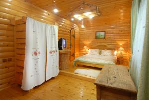 Postel nebo postele na pokoji v ubytování Doroga Dodomu