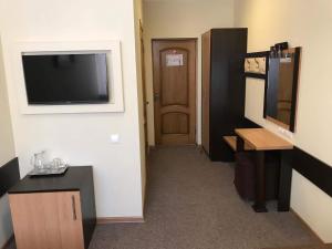 Kuchyň nebo kuchyňský kout v ubytování Central Hotel