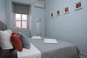 Ένα ή περισσότερα κρεβάτια σε δωμάτιο στο Lisboa - Belem1886 River View #2Brd #2bath