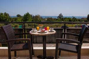Balkón nebo terasa v ubytování Thalassa Apart Hotel
