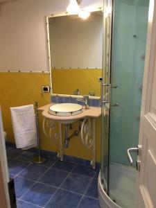 Koupelna v ubytování Cantaluna B&B
