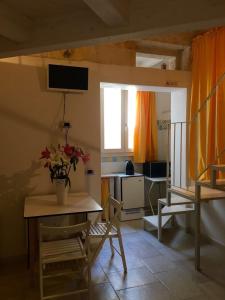 TV a/nebo společenská místnost v ubytování Cantaluna B&B