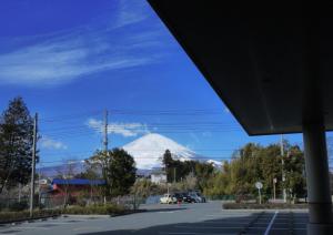 a view of a white mountain in the distance at Hotel Route-Inn Shin Gotemba Inter -Kokudo 246 gou- in Gotemba