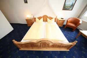 Ліжко або ліжка в номері Hotel Garni Krone