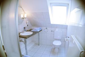Koupelna v ubytování Hotel Vier Linden