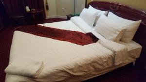 Postel nebo postele na pokoji v ubytování Hotel Berg Rappeg