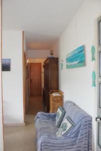 A bed or beds in a room at Primario