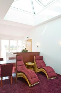 Posezení v ubytování Hotel Petersen