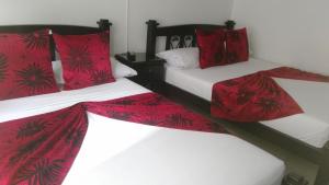 Voodi või voodid majutusasutuse Hotel Colonial toas
