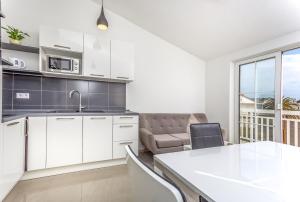 Kuhinja ili čajna kuhinja u objektu Jela Apartment