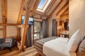 a bedroom with a bed and a large window at AlmRefugio in Neumarkt in der Oberpfalz