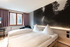 Katil atau katil-katil dalam bilik di Hotel Schwarzwälder Hof