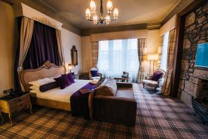 Postel nebo postele na pokoji v ubytování Lynnhurst Hotel