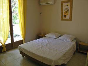 Postel nebo postele na pokoji v ubytování Mas de la Riviere + 45 fotografií