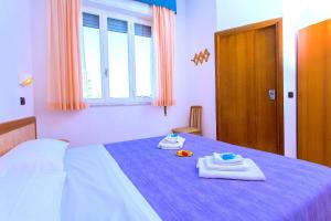 Postel nebo postele na pokoji v ubytování Hotel Majorca