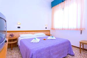Postel nebo postele na pokoji v ubytování Hotel Majorca