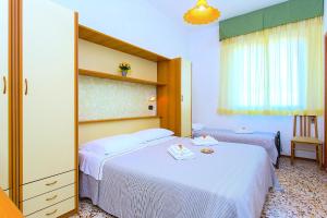 Postel nebo postele na pokoji v ubytování Hotel Majorca