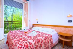 Postel nebo postele na pokoji v ubytování Hotel Majorca