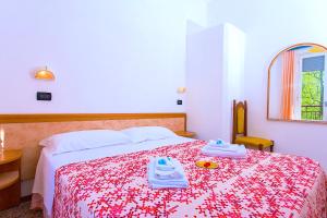 Postel nebo postele na pokoji v ubytování Hotel Majorca