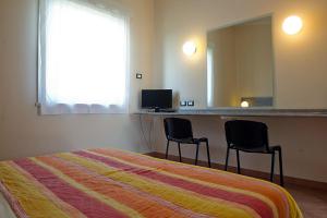 TV o dispositivi per l'intrattenimento presso AutoHotel