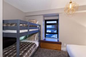 A bed or beds in a room at Gibbons Life Accommodations