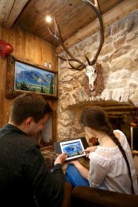 TV a/nebo společenská místnost v ubytování B&Bio Garda Ulivi