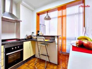 Kjøkken eller kjøkkenkrok på Alexander Apartments