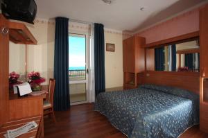 Postel nebo postele na pokoji v ubytování Park Hotel Perù ***S