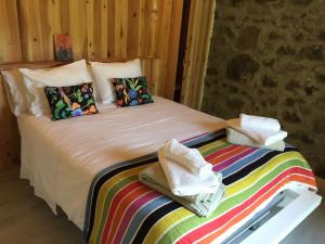 Cama ou camas em um quarto em Casa Do Populo