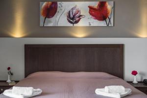 Кровать или кровати в номере Mirtilos Studios & Apartments