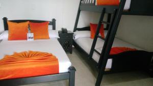 Voodi või voodid majutusasutuse Hotel Colonial toas