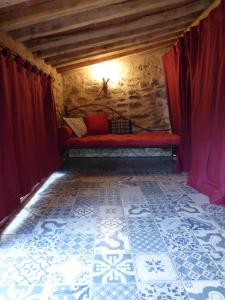Tempat tidur dalam kamar di Mas de la Fariole