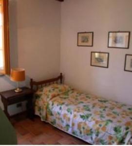Katil atau katil-katil dalam bilik di Agriturismo Montaperti