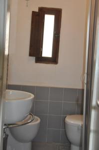 Et badeværelse på Appartamentino Pomelia