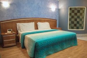 Voodi või voodid majutusasutuse Autohotel Ilussion toas